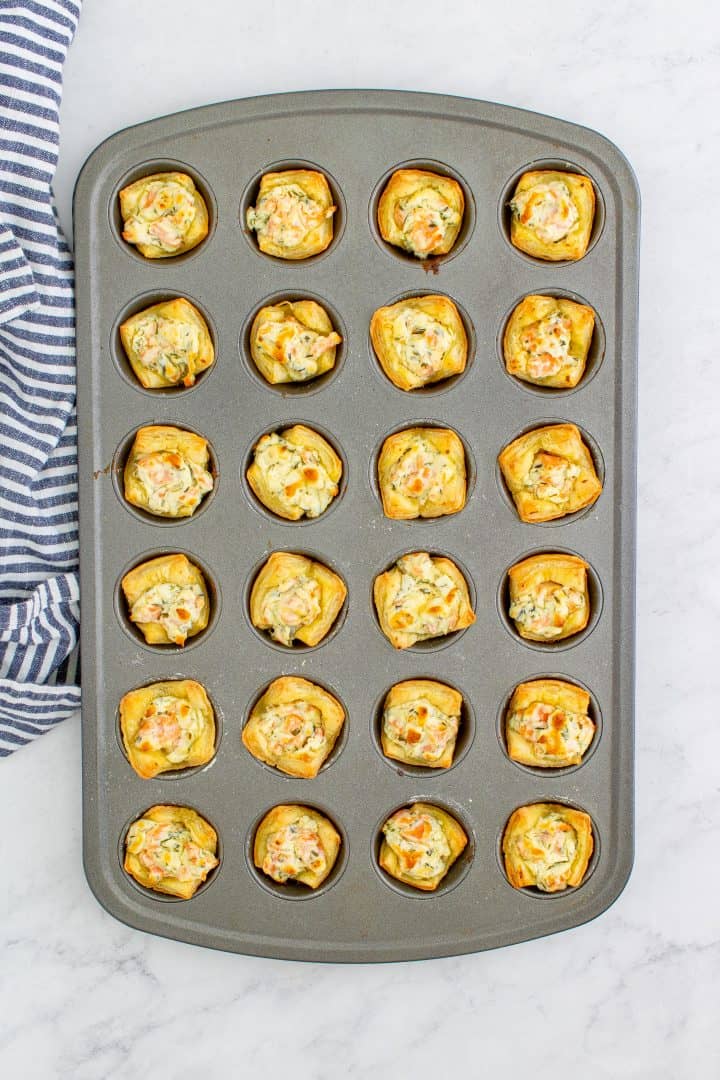 Finished baked Smoked Salmon Puff Pastry Bites in mini muffin tin