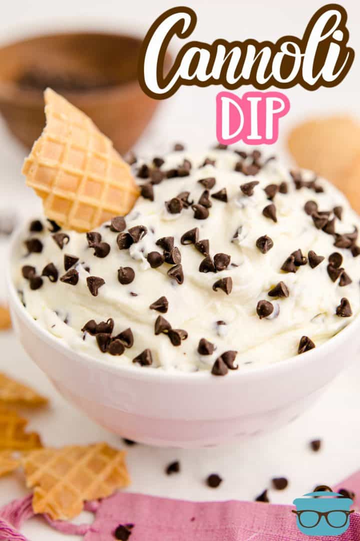 Finished Cannoli Dip in white bowl with chocolate chips and waffle cone in bowl Pinterest image