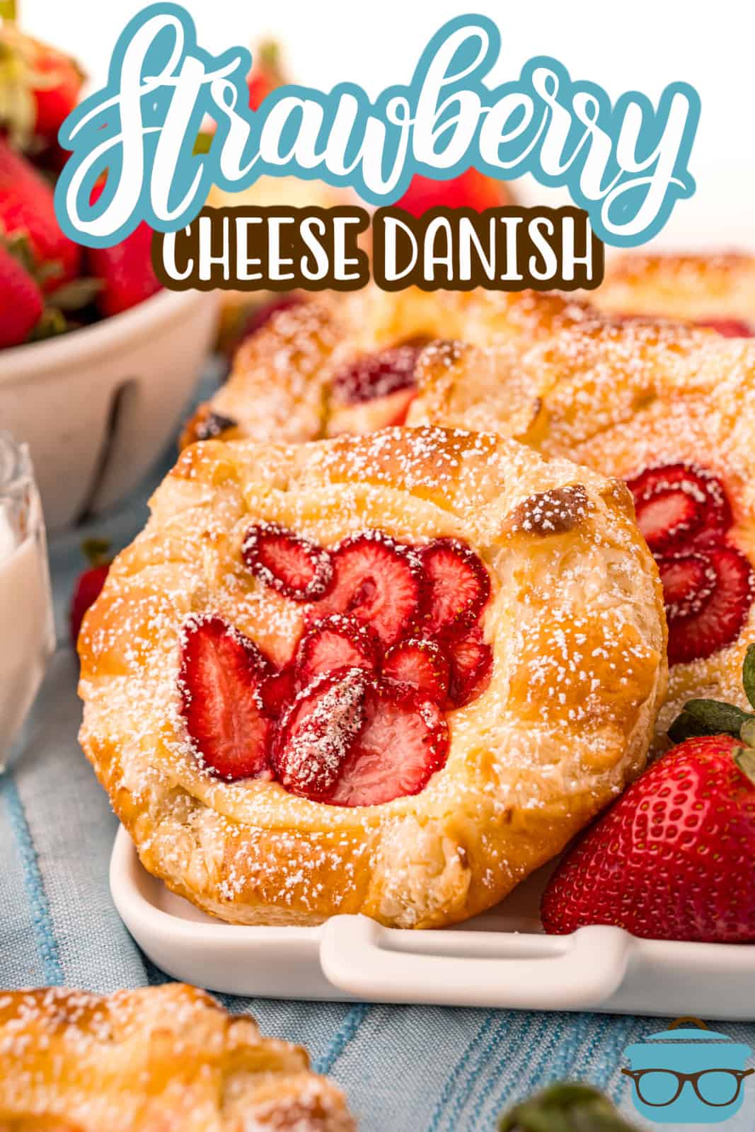 Close up of one Strawberry Cheese Danish topped with powdered sugar Pinterest image