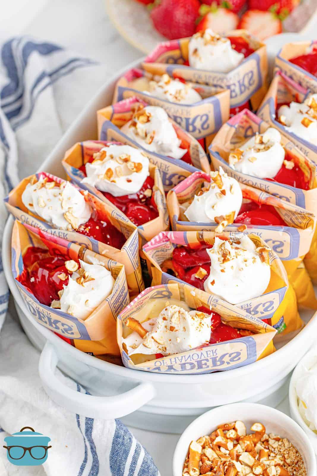 Walking Strawberry Pretzel Salad packages in white dish