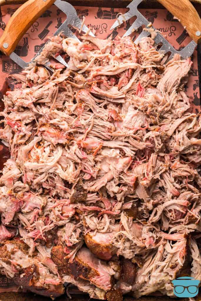 Overhead of shredded Smoked Pulled Pork on tray