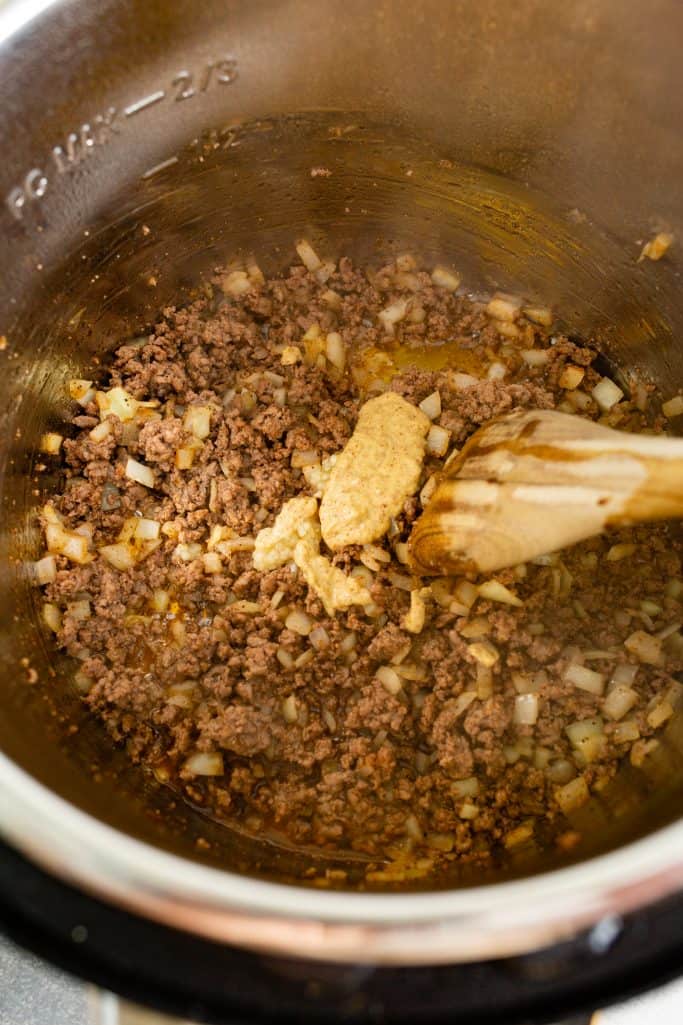 Minced garlic, worcestershire sauce and mustard added to instant pot
