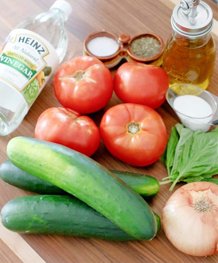 ingredients needed: cucumbers, tomatoes, sweet onion, white vinegar, water, olive oil, granulated sugar, kosher salt, freshly ground black pepper.