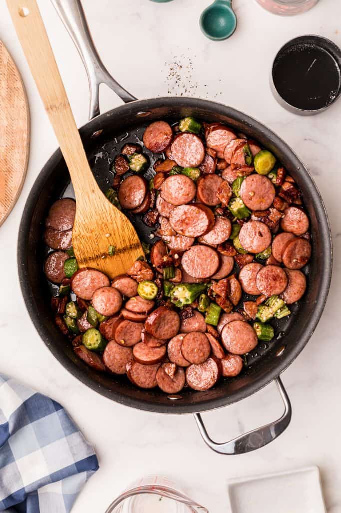 Browned sausage and okra in pan