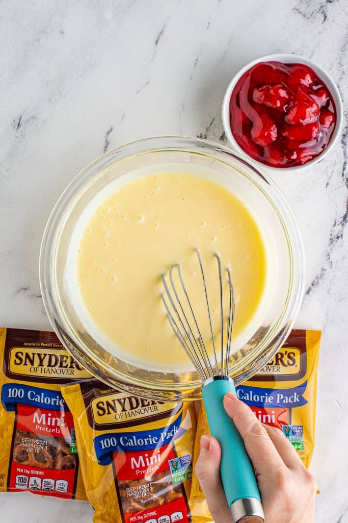 Cheesecake pudding being whisked together