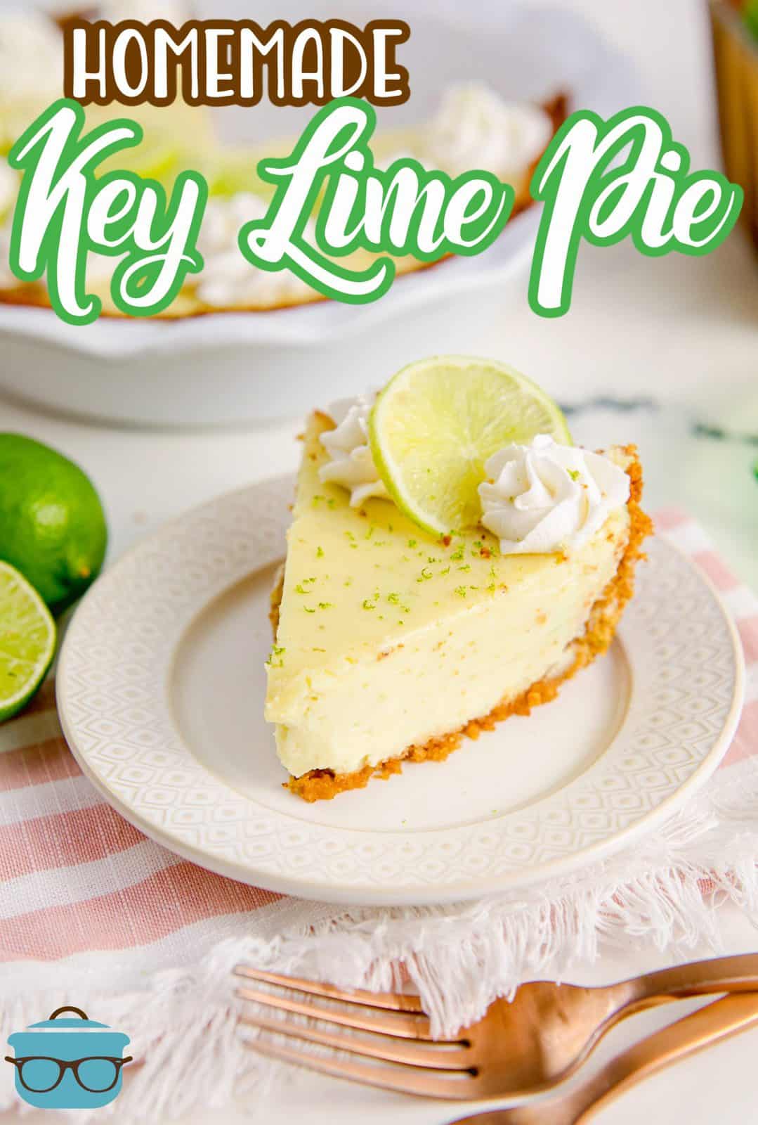 Pinterest image of Homemade Key Lime Pie on white plate with whipped cream swirls and lime slice