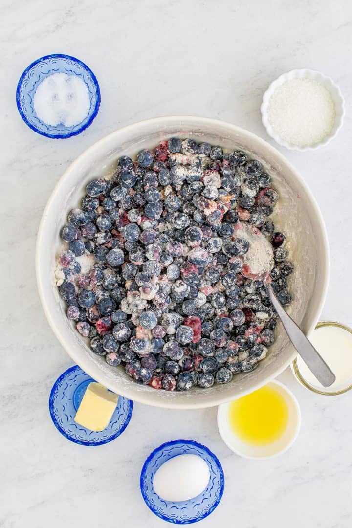 Blueberry Mixture stirred together in a white bowl.