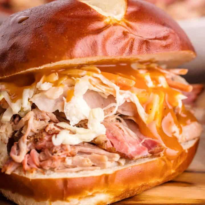 Square close up image of Smoked Pulled Pork as a sandwich