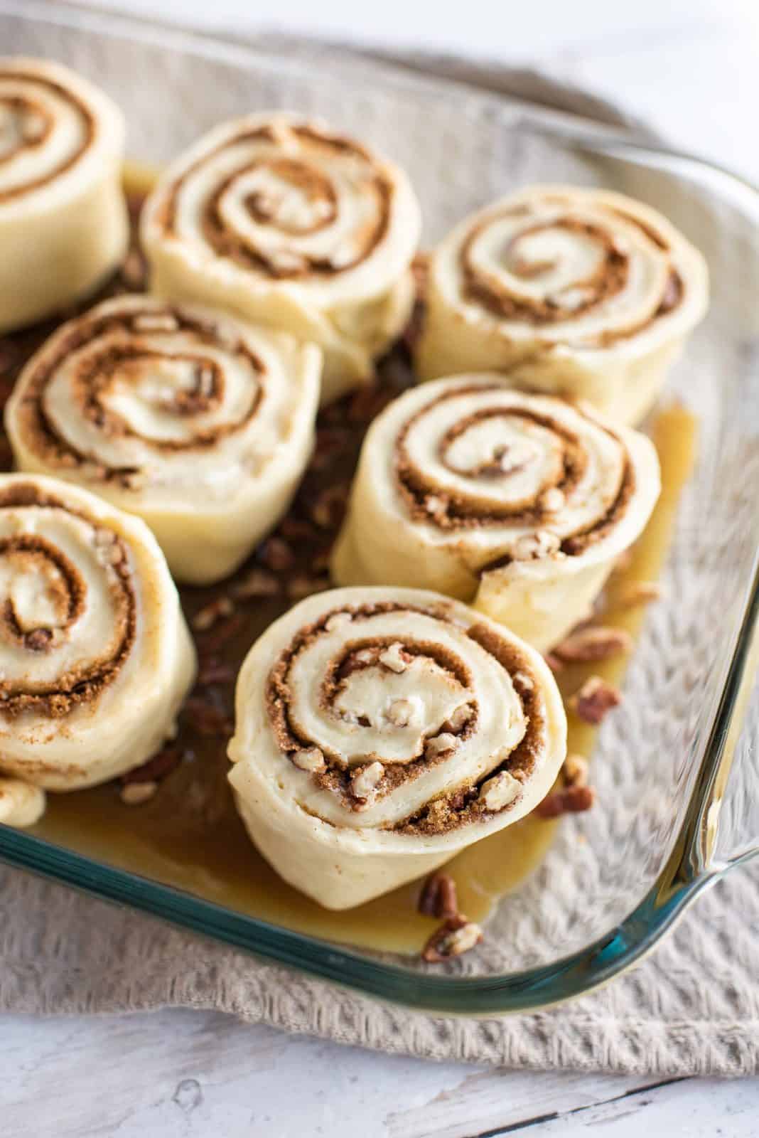 Cut and filled buns in baking pan.