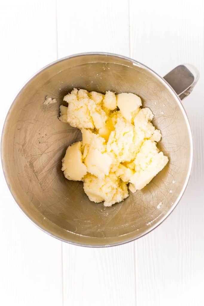 Butter and sugar beaten together in bowl of stand mixer.