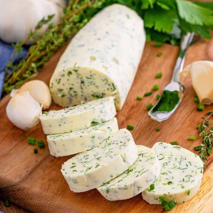 Square image of finished and sliced Garlic Herb Butter.