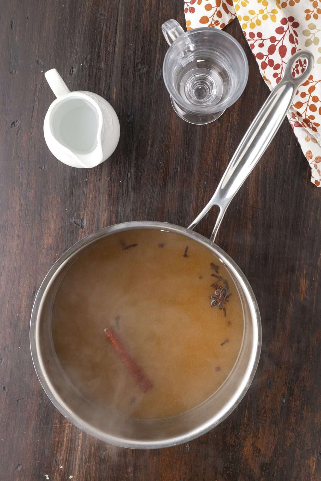 Cocktail ingredients simmering in saucepan.