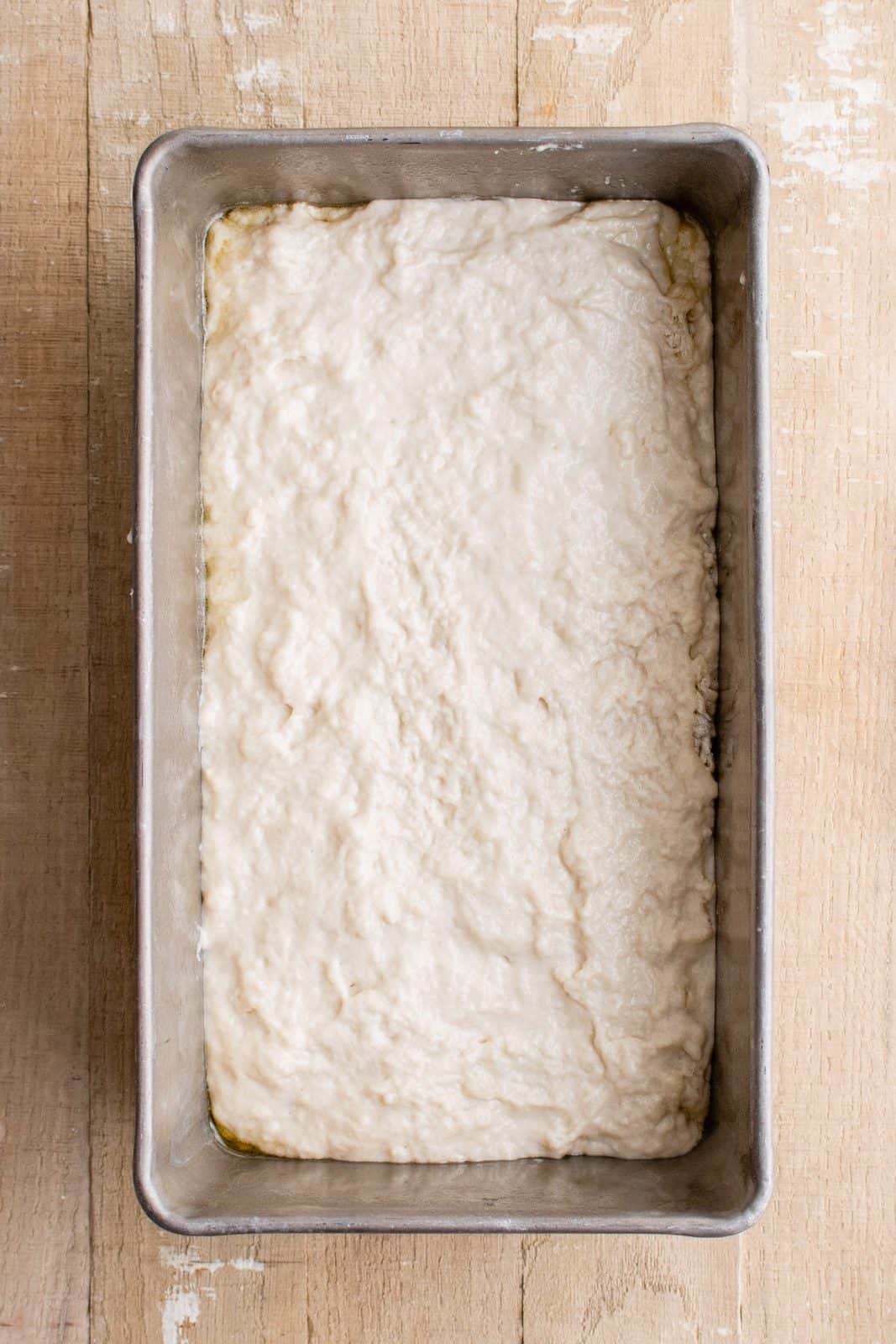 Batter spread in loaf pan.