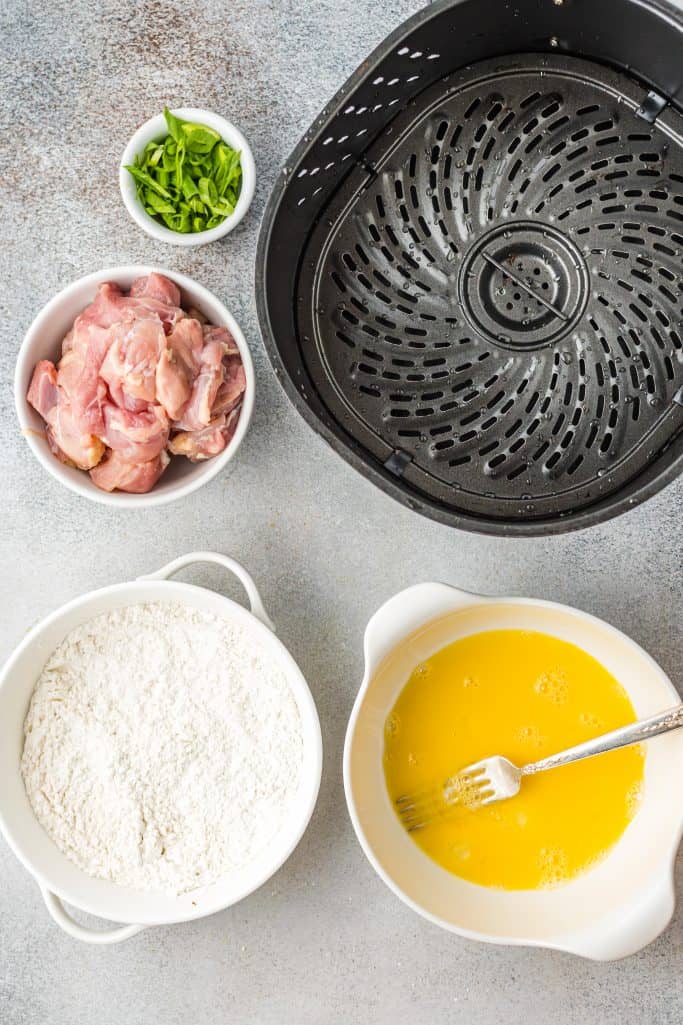 Cornstarch, all purpose flour, salt and pepper whisked together in one bowl and egg whisked in another.