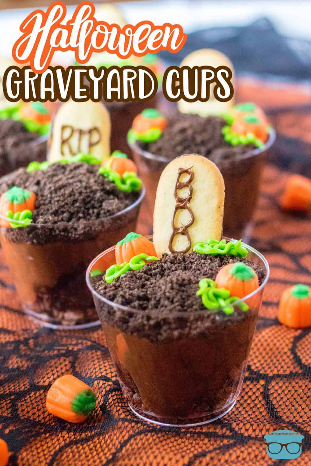 Close up of Halloween Graveyard Cups shown on orange and black lace. 