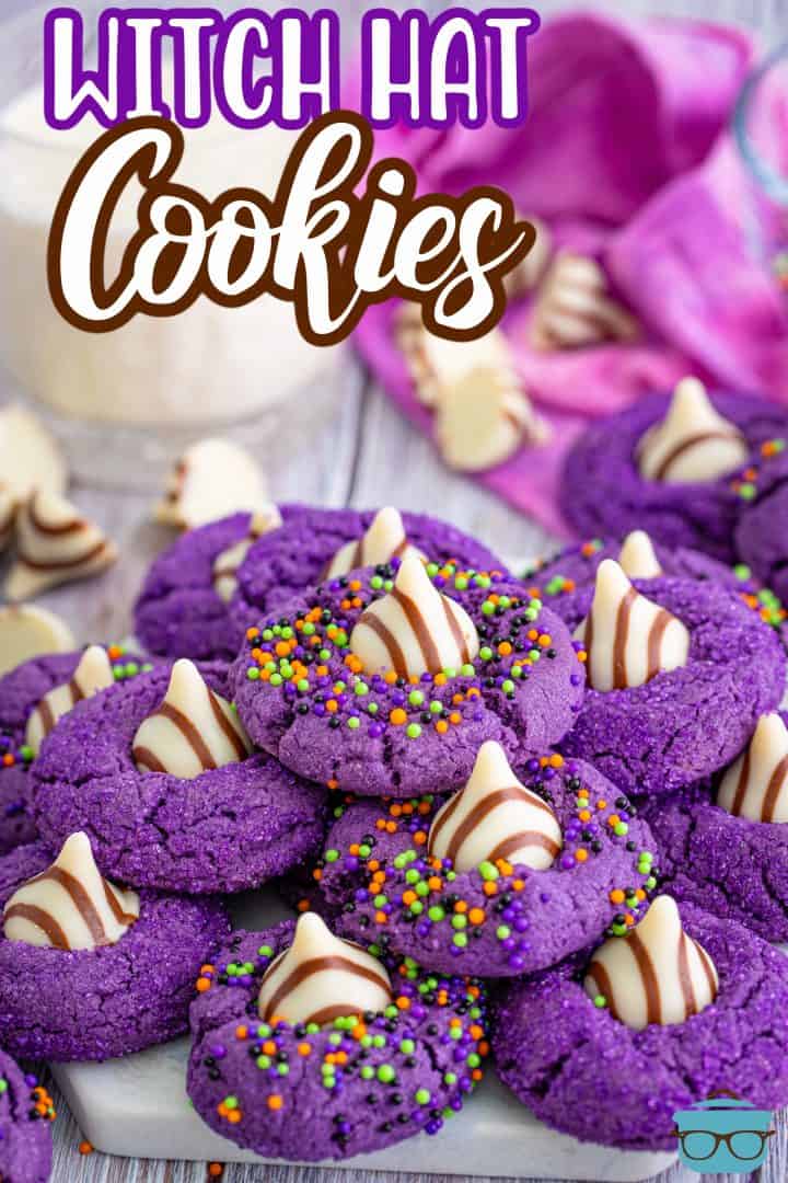 Pinterest image of Halloween Witch Hat Cookies stacked on platter.