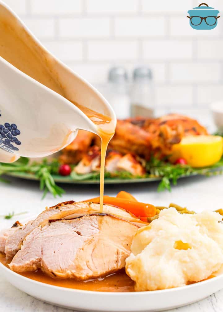 The Best Turkey Gravy Recipe being poured over turkey.