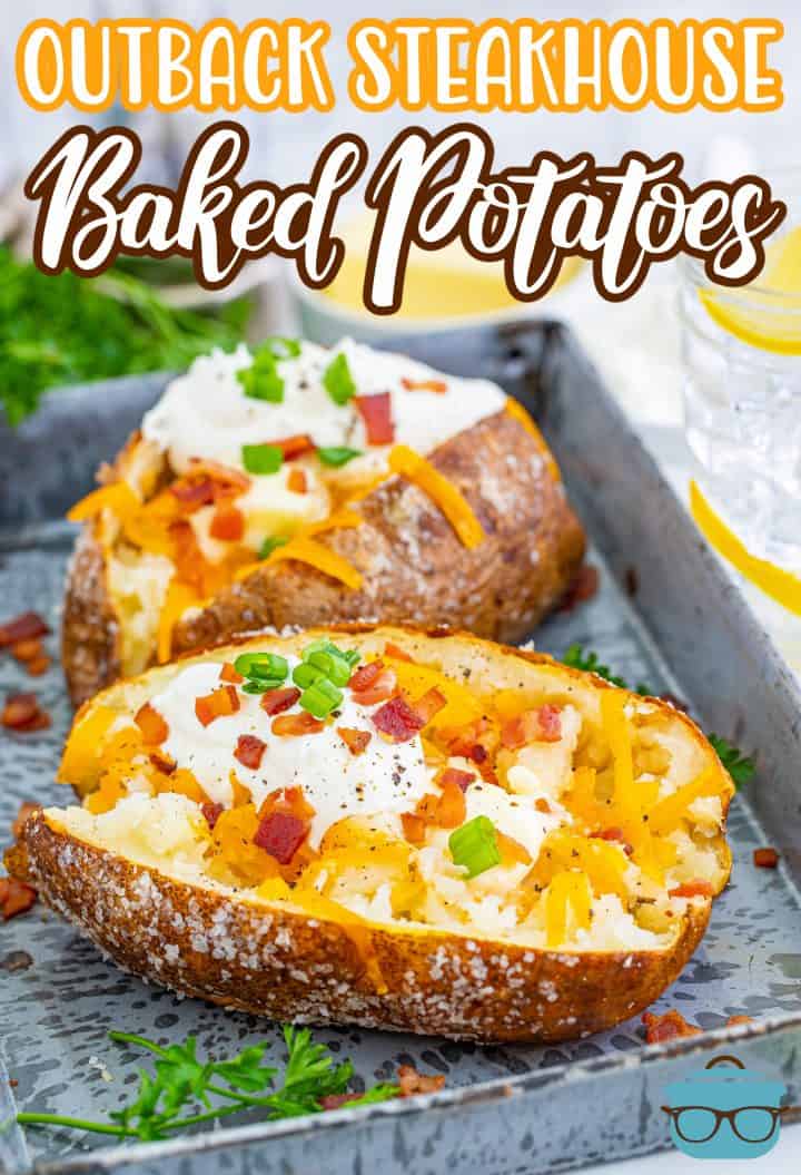 Pinterest image of topped Outback Steakhouse Baked Potatoes on metal tray.