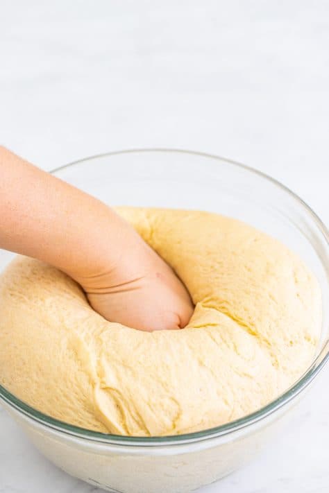 punching down yeast dough.