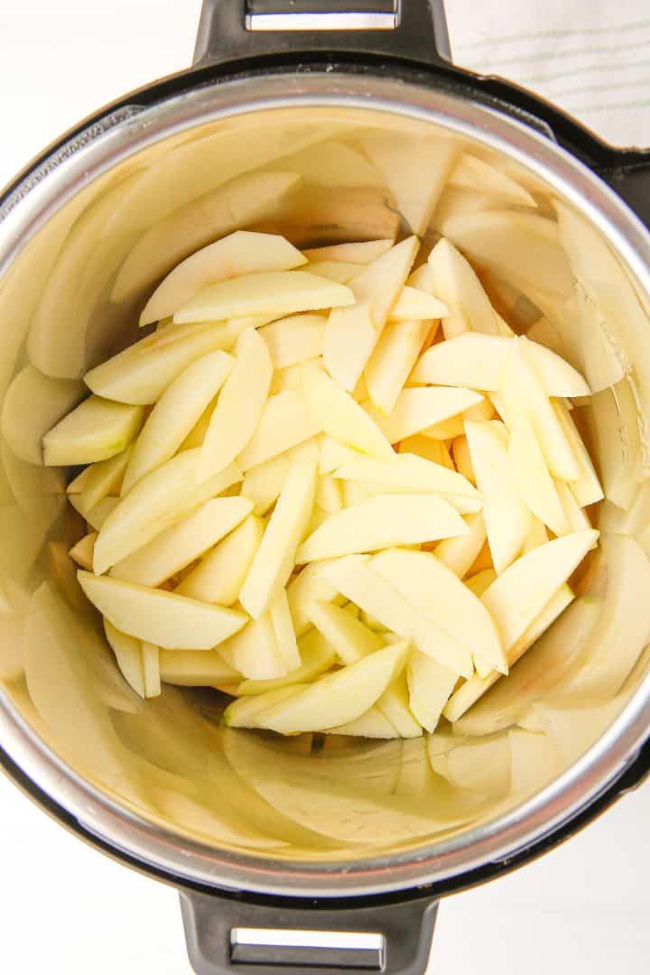 Apples placed in instant pot.