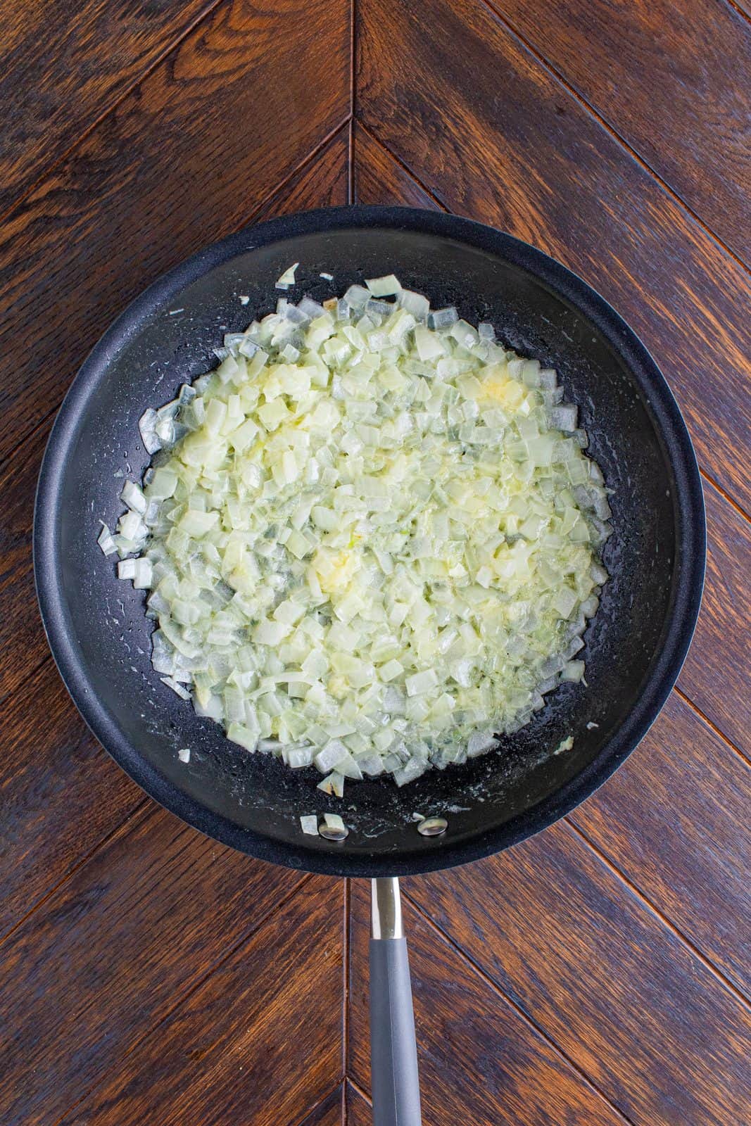 Butter, onion and garlic in sautee pan.