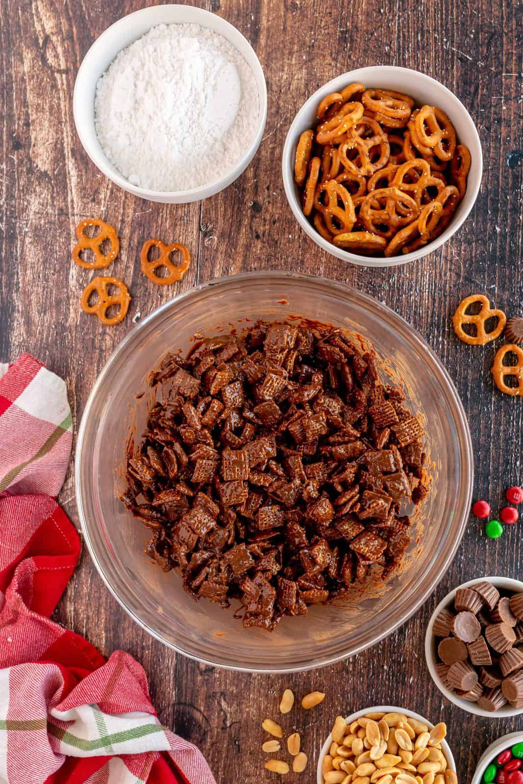 Chocolate mixture poured over chex cereal in bowl and stirred together.