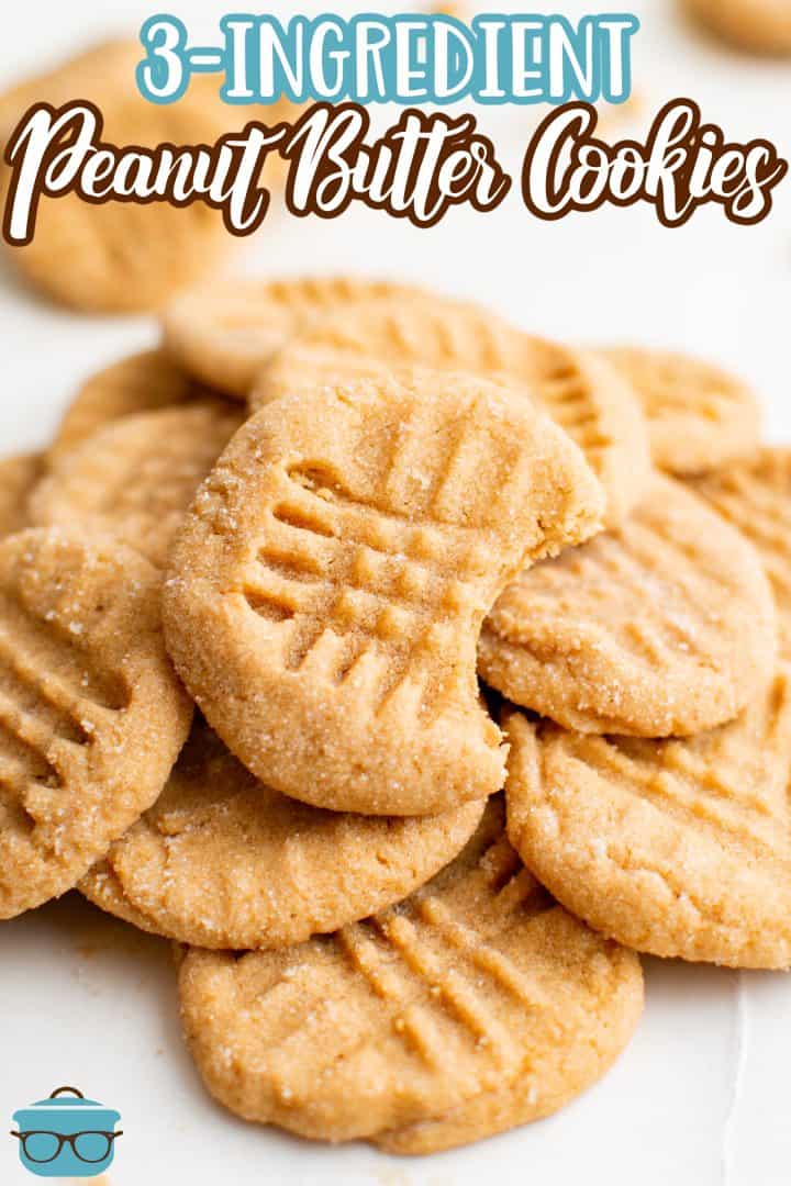 Pinterest image of piled 3-Ingredient Peanut Butter Cookies with bite taken out of top cookie.