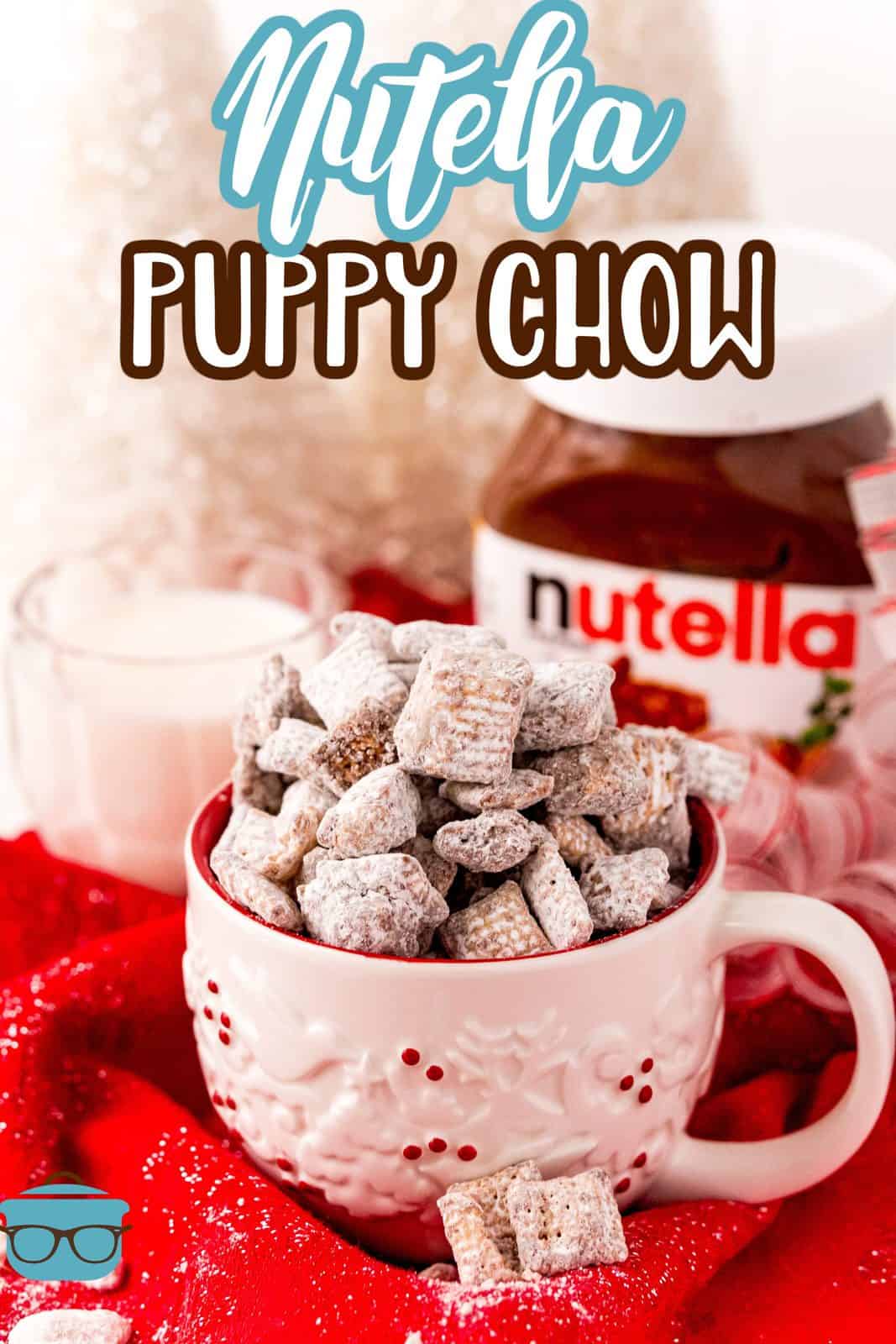 Pinterest image of pink mug with Nutella Puppy Chow stacked in it.