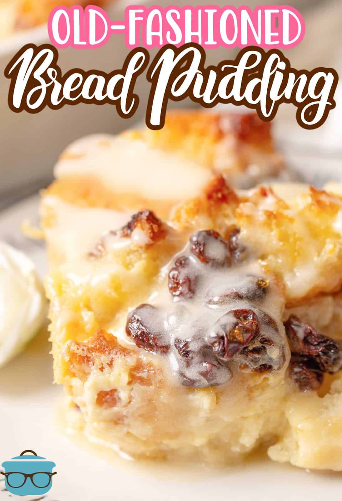 Pinterest image of slice of Old Fashioned Bread Pudding dripping with sauce and raisins.
