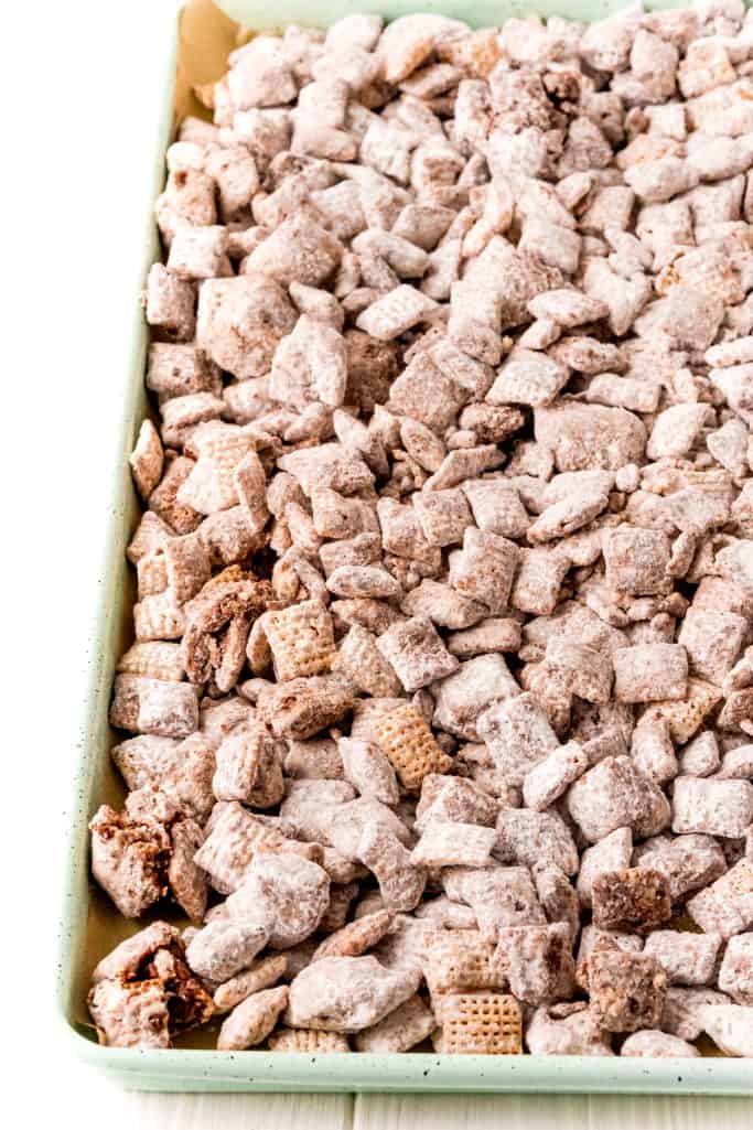 Puppy Chow on baking sheet to set up.