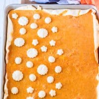 Square image close up of Sweet Potato Slab Pie showing pie crust decorations.