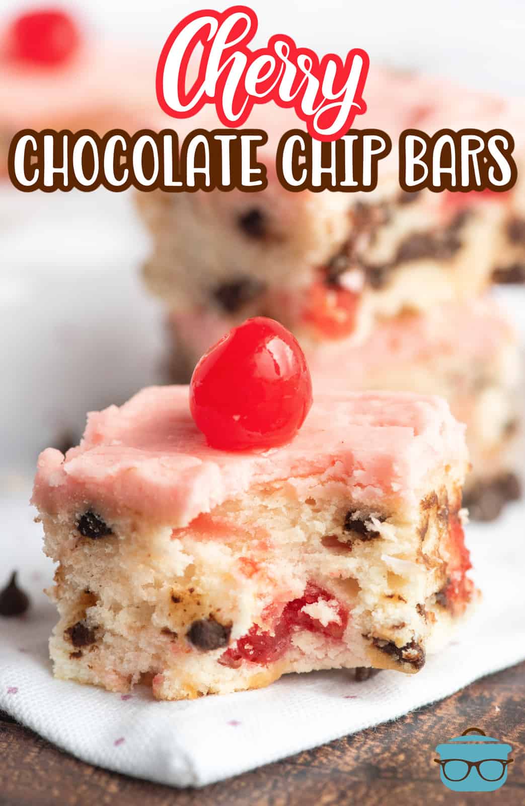 Pinterest image of one Cherry Chocolate Chip Bar with cherry on top and bite taken out.
