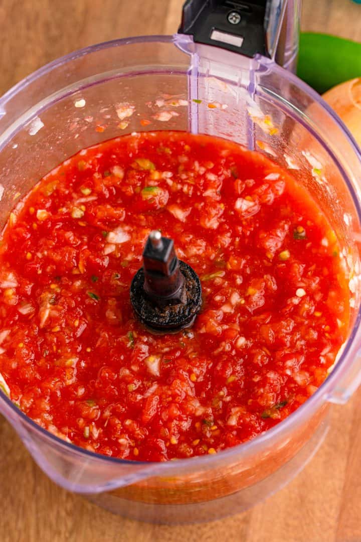 fully processed salsa in a food processor.