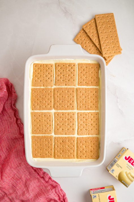 Final layer of graham crackers on top of the mixture.