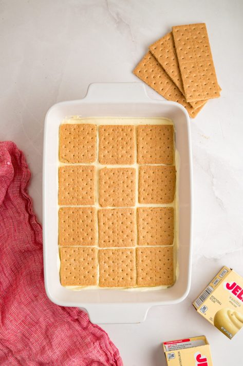 Graham crackers on top of pudding mixture.