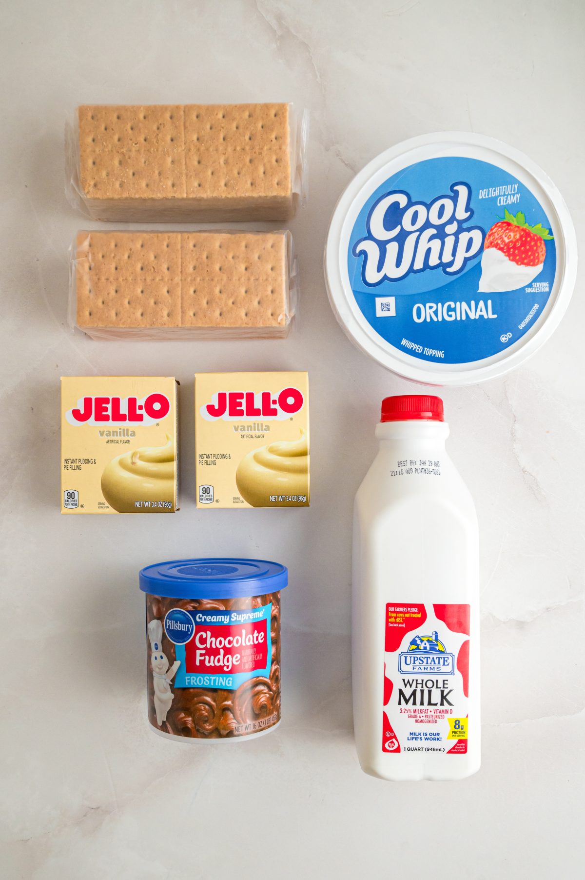graham crackers, vanilla pudding, milk, cool whip, chocolate frosting.