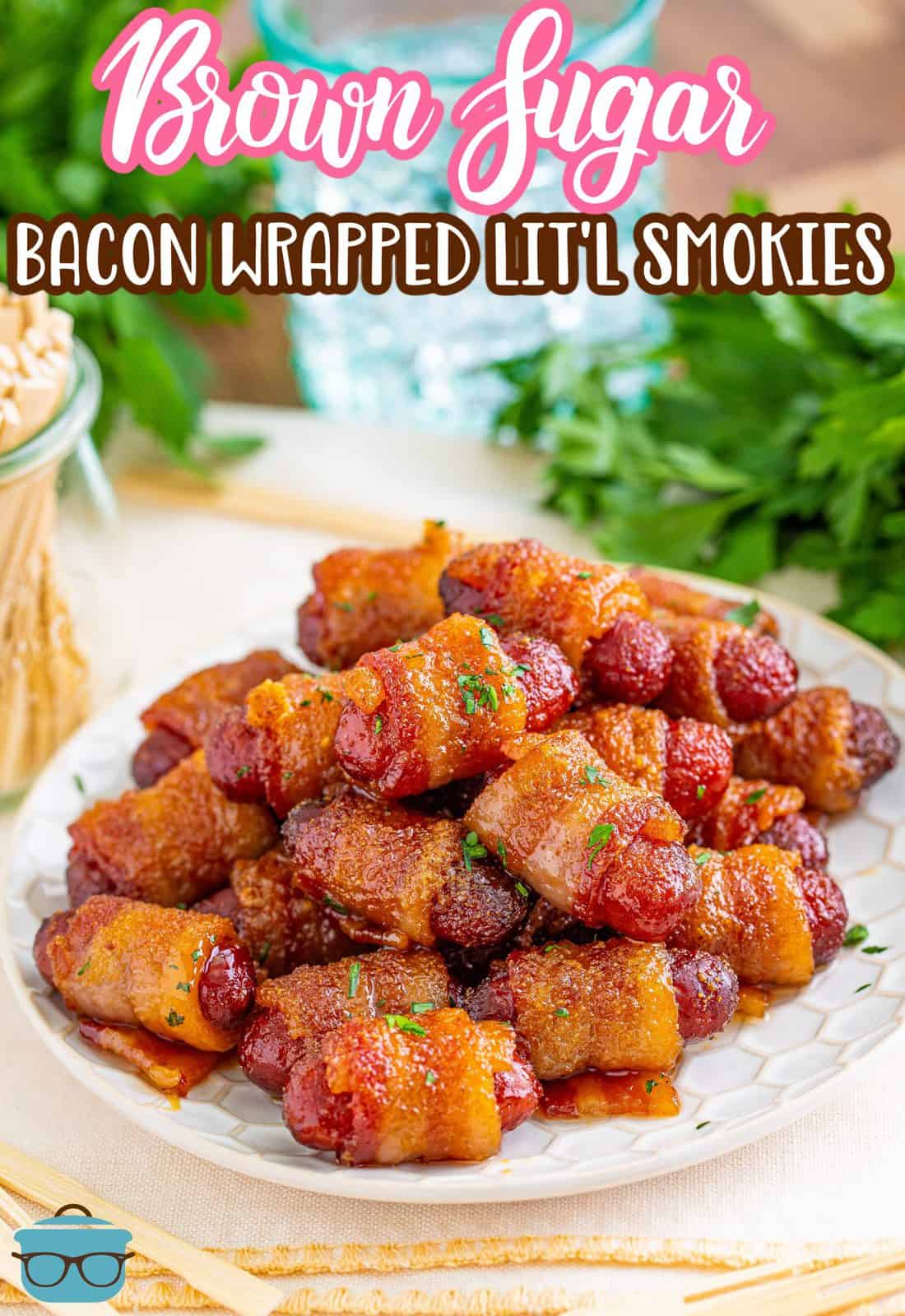 Pinterest image of Brown Sugar Bacon Wrapped Little Smokies on white plate with parsley in background.