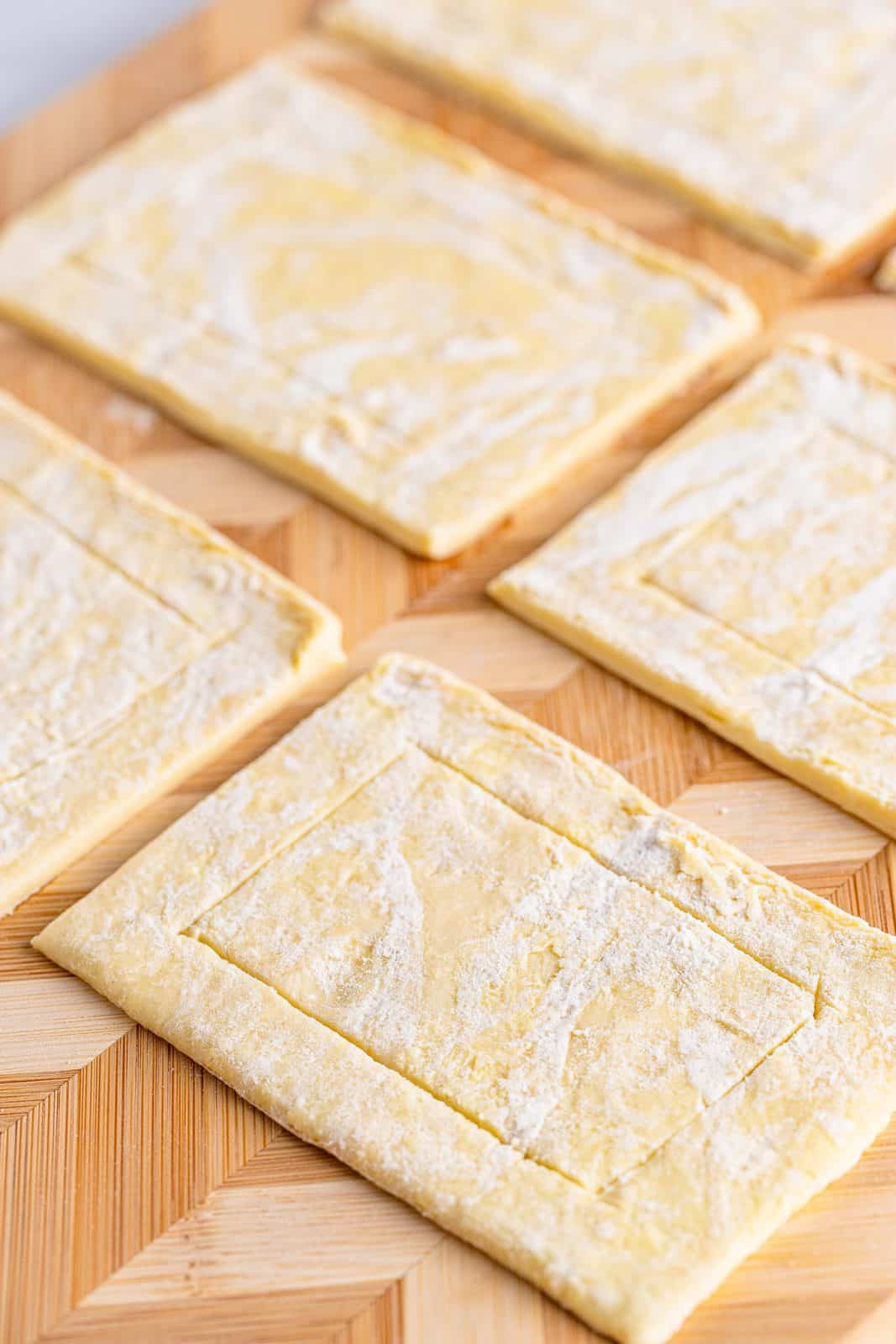 Puff pastry cut into rectangles scored on the sides.