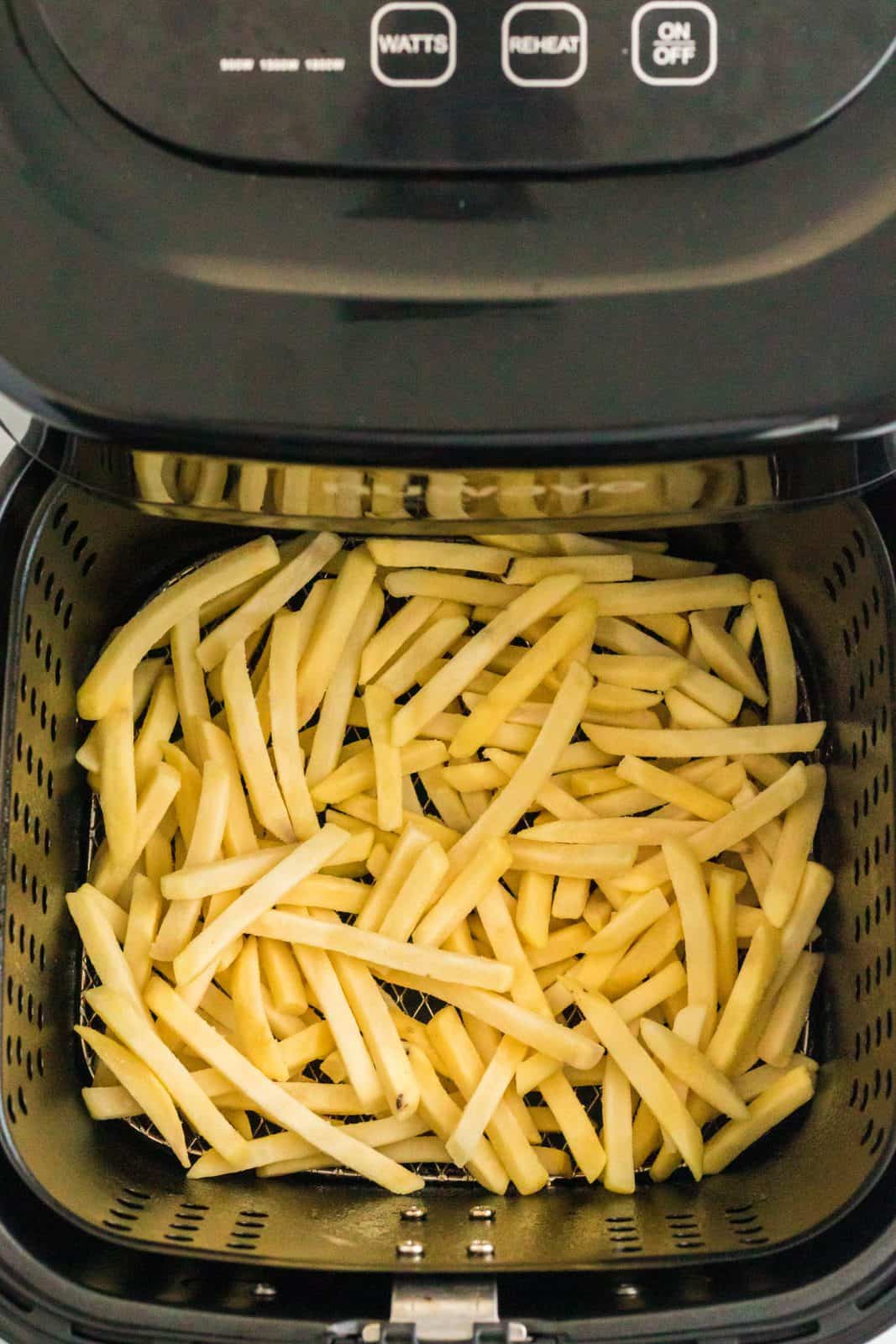 Frozen french fries in air fryer.
