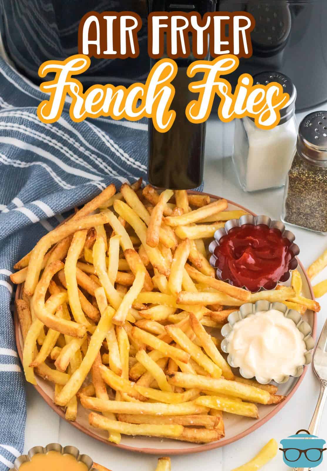 Round platter with Air Fryer Frozen French Fries with dipping sauces in front of air fryer Pinterest image.