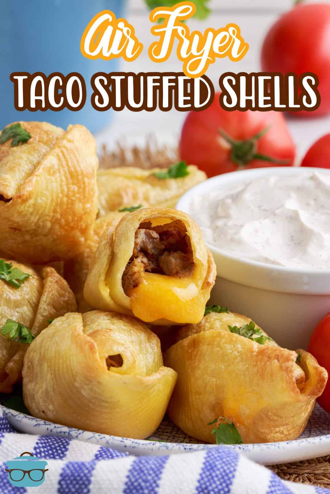 Pinterest image of Air Fryer Taco Stuffed Shells stacked on plate with one showing inside and cheese running out of it.