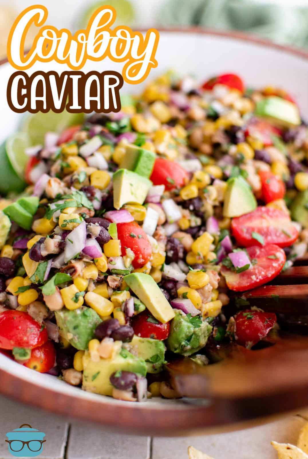 Pinterest image of Cowboy Caviar on wooden plate Pinterest image.