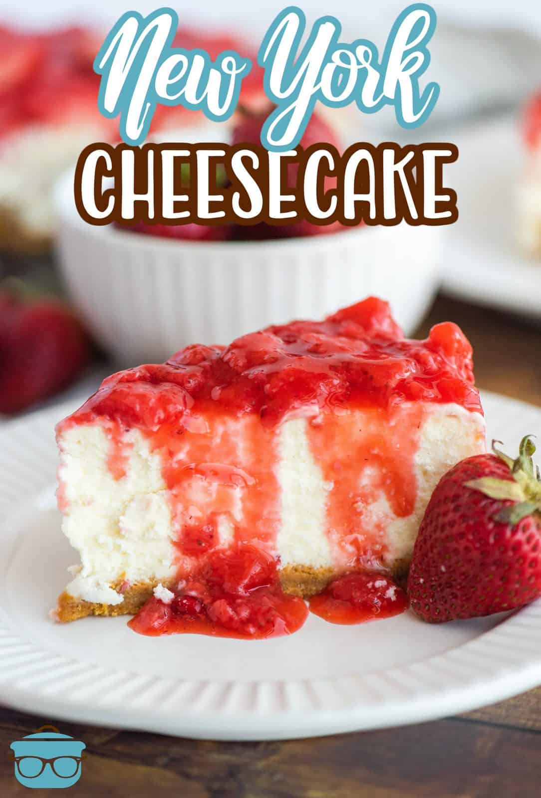 Pinterest image of slice of Strawberry Cheesecake with strawberry sauce dripping down sides on white plate with strawberry.