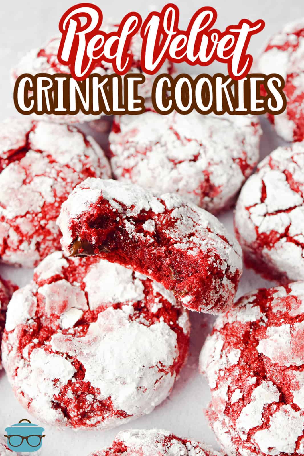 Stacked Red Velvet Crinkle Cookies showing one cookie standing up with bite taken out of it Pinterest image.