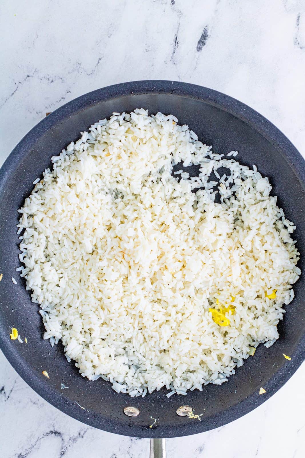 Rice added to pan.