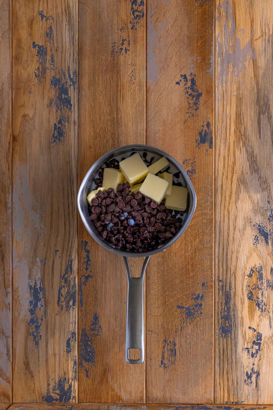 butter and chocolate chips in a sauce pan. 