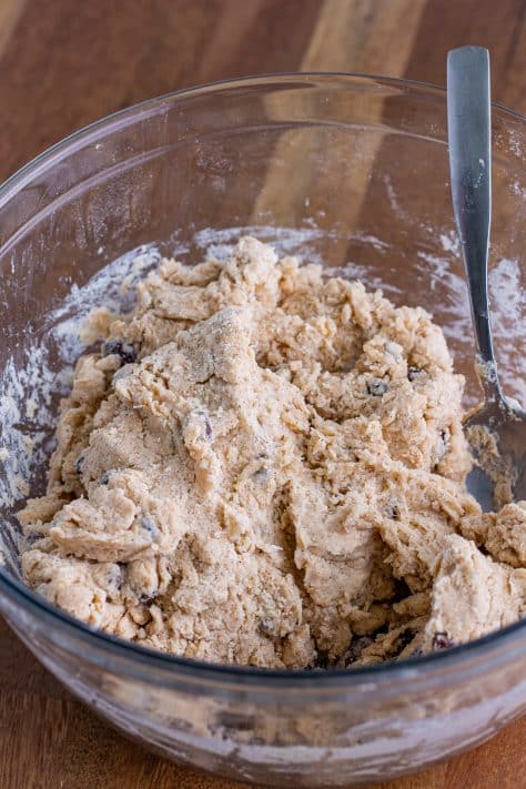 Cinnamon Raisin Biscuit dough in a mixing bowl.