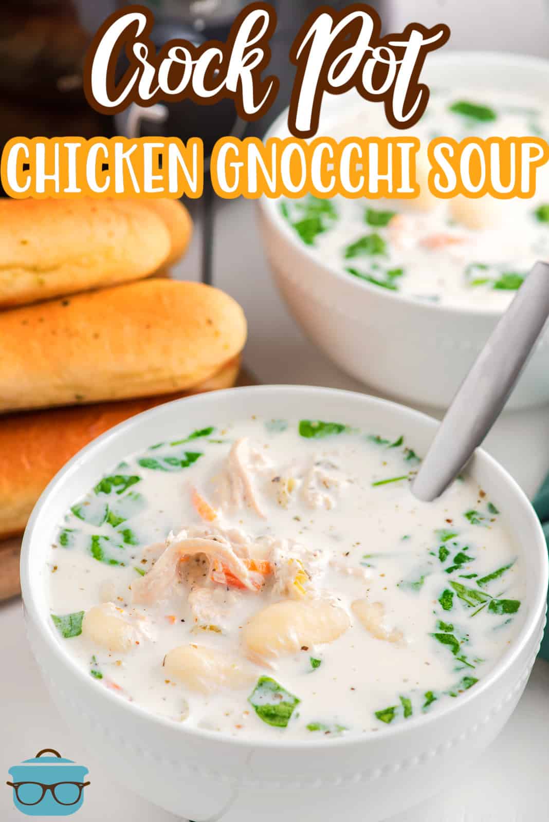 Pinterest image of Crock Pot Olive Garden Chicken Gnocchi Soup in white bowl with spoon and breadsticks behind it.