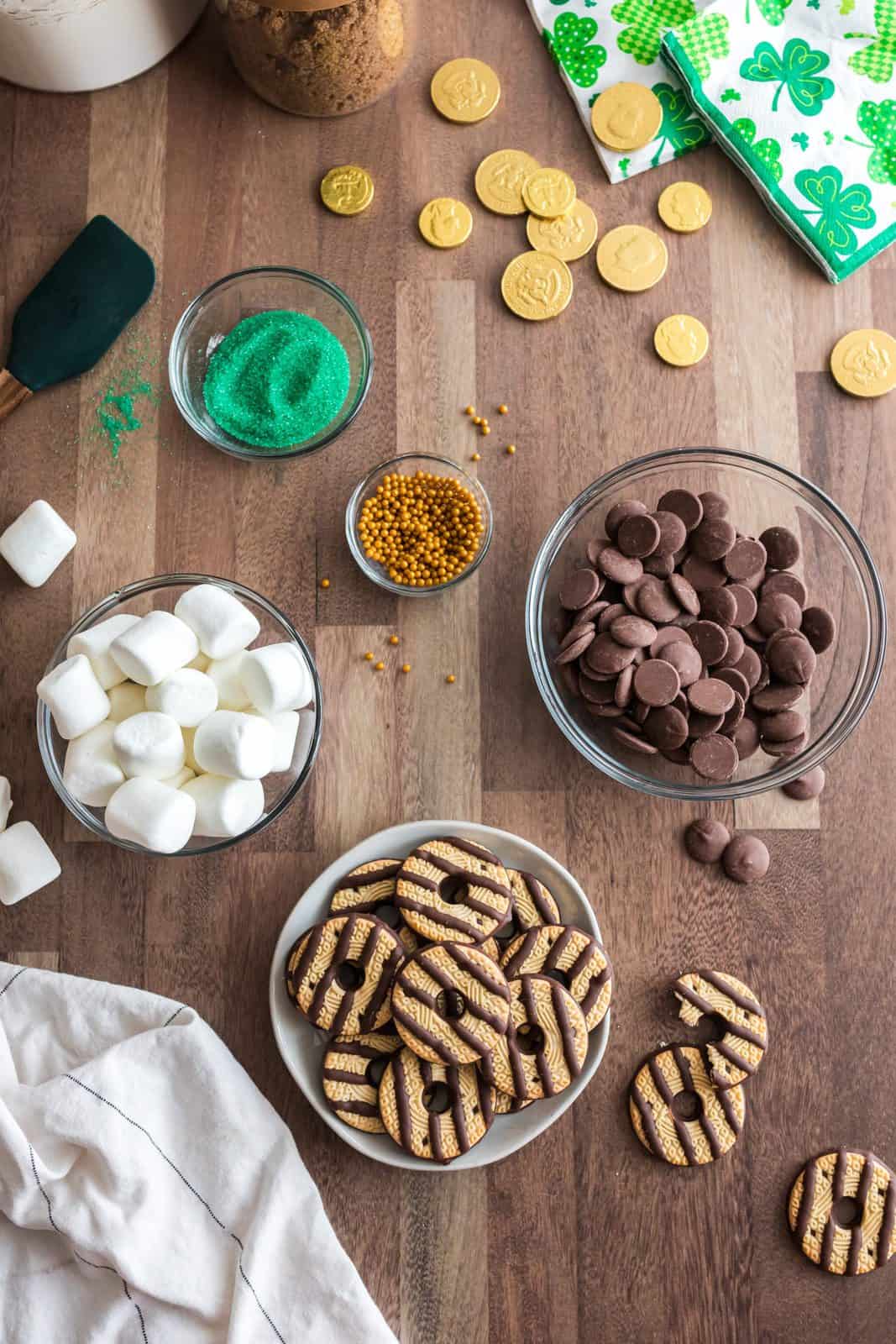 Ingredients needed: fudge-stripe cookies, marshmallows, melting chocolate and sprinkles.