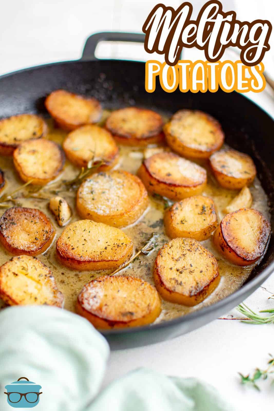 Pinterest image of Melting Potatoes finished and garnished in pan.